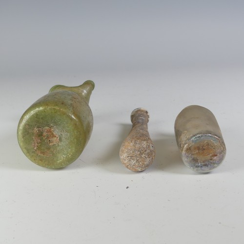 164 - A Roman pale glass Oil Ewer, with waisted body and flared trefoil rim, handle and glass trail, H 12.... 