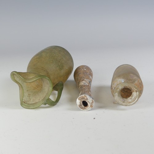 164 - A Roman pale glass Oil Ewer, with waisted body and flared trefoil rim, handle and glass trail, H 12.... 