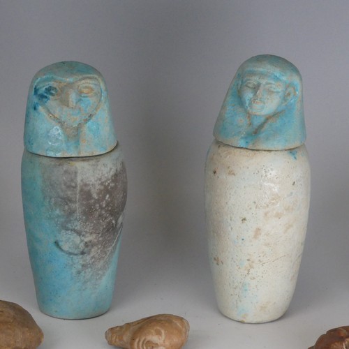 166 - An Egyptian-style azure blue pottery Canopic Jar, in the form of Ra, H 16.5cm, together with another... 