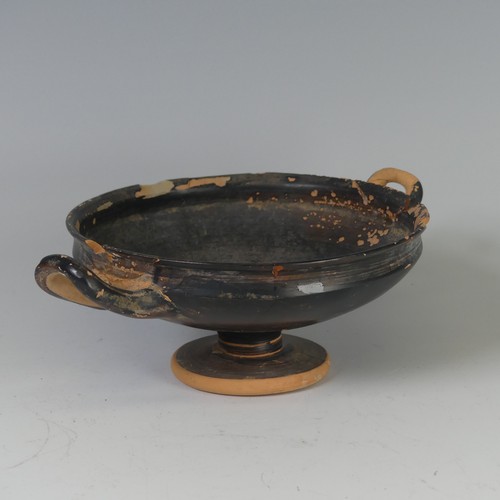 168 - An antique terracotta Kylix, possibly c. 4 BC, H 7cm, together with a terracotta Goblet, with centra... 