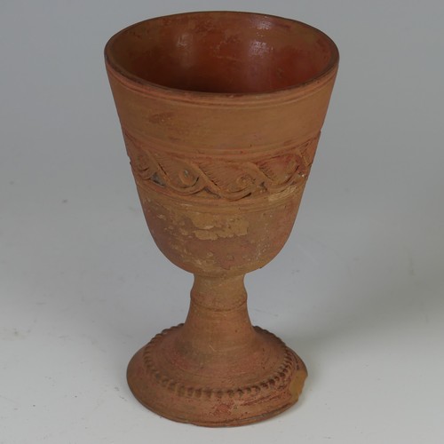 168 - An antique terracotta Kylix, possibly c. 4 BC, H 7cm, together with a terracotta Goblet, with centra... 