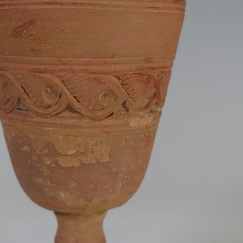 168 - An antique terracotta Kylix, possibly c. 4 BC, H 7cm, together with a terracotta Goblet, with centra... 