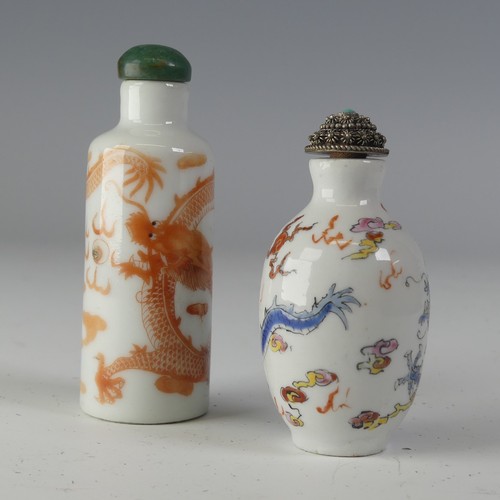 145 - An early 20thC Chinese porcelain Snuff Bottle, decorated in iron red depiction of dragon chasing the... 