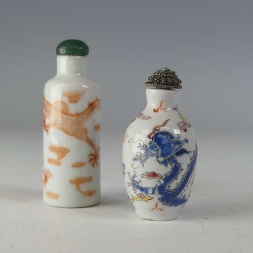 145 - An early 20thC Chinese porcelain Snuff Bottle, decorated in iron red depiction of dragon chasing the... 