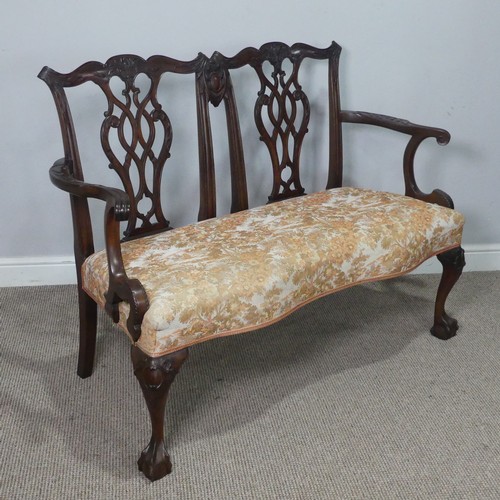 456 - An antique Chippendale style mahogany two chair-back Settee, carved and pierced backrests flanked by... 