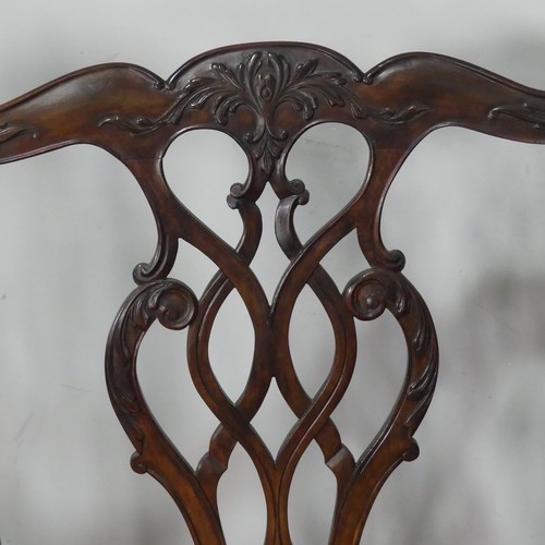 456 - An antique Chippendale style mahogany two chair-back Settee, carved and pierced backrests flanked by... 