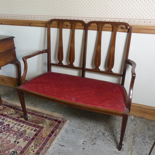 462 - An Edwardian mahogany and inlaid double chair backed Settee, raised on tapering supports, W 101 cm x... 