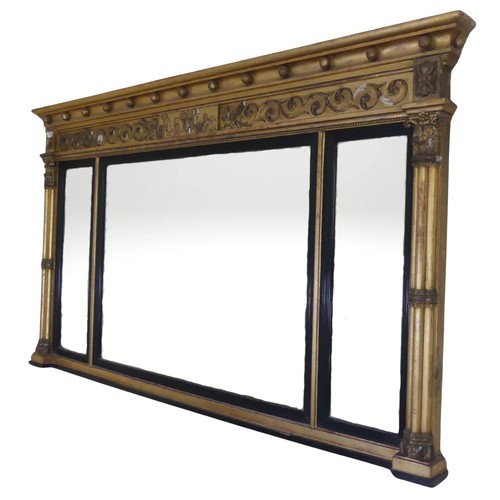 467 - A Regency carved giltwood and ebonised triptych overmantle Mirror, the moulded cornice with applied ... 