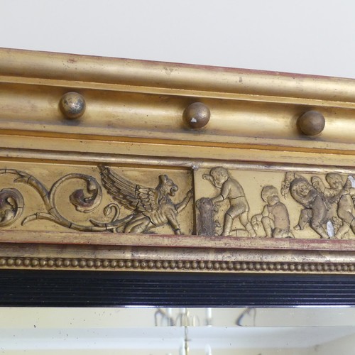 467 - A Regency carved giltwood and ebonised triptych overmantle Mirror, the moulded cornice with applied ... 