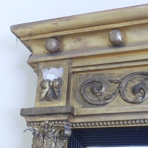 467 - A Regency carved giltwood and ebonised triptych overmantle Mirror, the moulded cornice with applied ... 