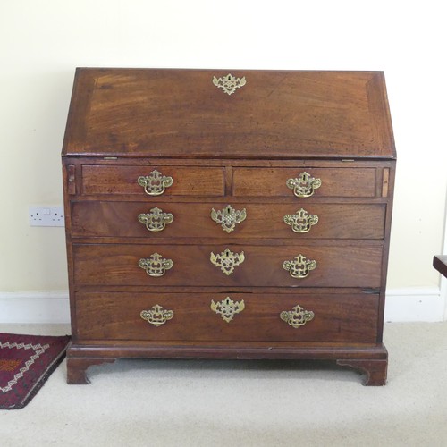 469 - A George III mahogany Bureau, hinged sloped fall front concealing fitted interior and writing surfac... 