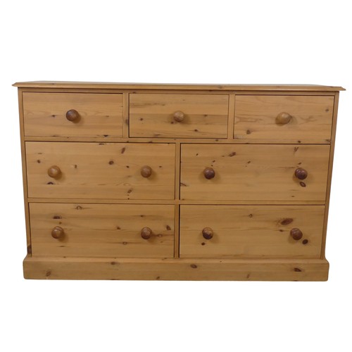 472 - A contemporary pine Chest of drawers, three short drawers over four long drawers, raised on plinth b... 