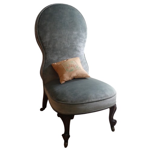 474 - A Victorian upholstered nursing Chair, with shaped backrest, raised on carved cabriole supports, W 5... 