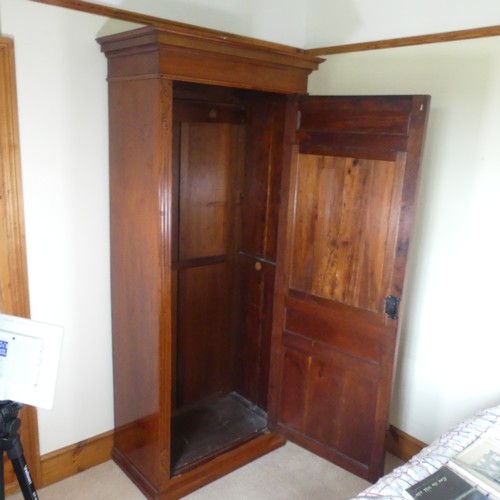 476 - A Victorian mahogany sentry box single Wardrobe, moulded cornice over bevelled glass mirror, above p... 