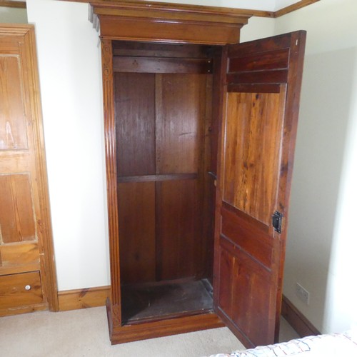 476 - A Victorian mahogany sentry box single Wardrobe, moulded cornice over bevelled glass mirror, above p... 