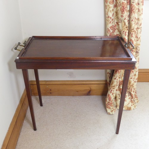 479 - A 20th century mahogany folding butlers Table, with gallery and brass carrying handles to either end... 