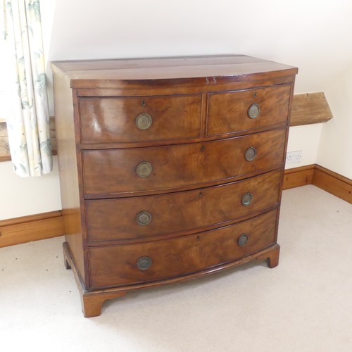 484 - A George III mahogany bow-fronted Chest of drawers, of two short drawers over three long drawers, ra... 