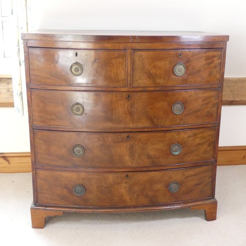 484 - A George III mahogany bow-fronted Chest of drawers, of two short drawers over three long drawers, ra... 