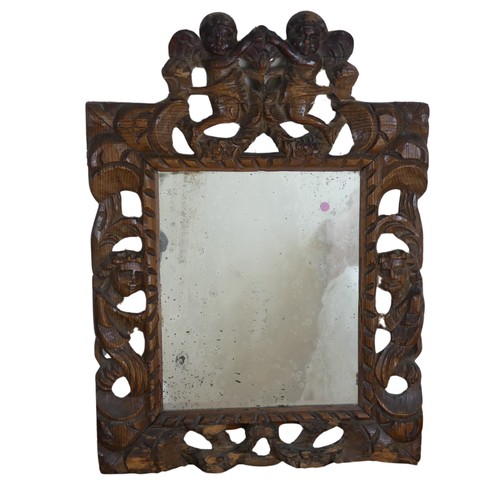 489 - An antique carved oak wall Mirror, W 37 cm x H 51 cm, together with a long mahogany wall Mirror, W 3... 