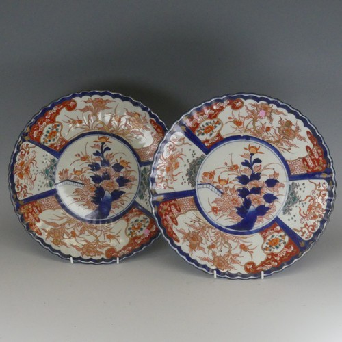 151 - A pair of early 20thC Japanese porcelain Imari Chargers, decorated in typical style with alternating... 