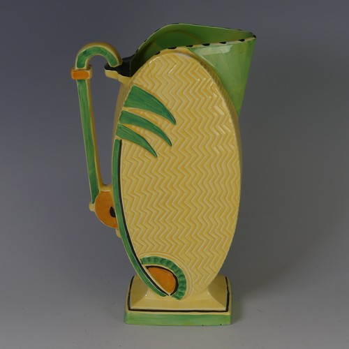 99 - An Art Deco Burleigh Ware pottery Jug, of panelled oval from with loop handle and square base, paint... 