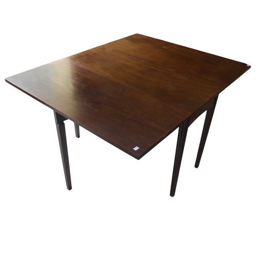 498 - A 19th century mahogany gateleg Table, raised in reeded tapering legs, W 138 cm x H 72 cm x D 108 cm... 