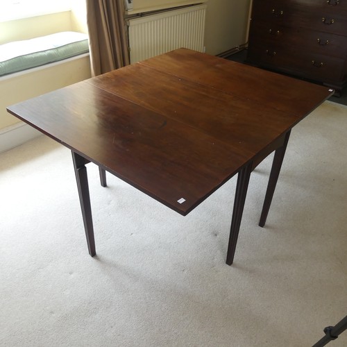 498 - A 19th century mahogany gateleg Table, raised in reeded tapering legs, W 138 cm x H 72 cm x D 108 cm... 