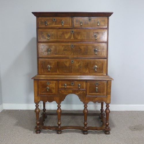 499 - A Georgian style walnut veneered Chest on stand, the 18th century top with moulded cornice over two ... 