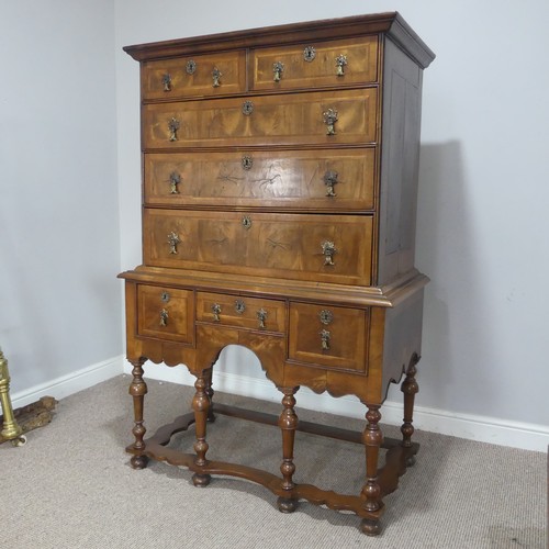 499 - A Georgian style walnut veneered Chest on stand, the 18th century top with moulded cornice over two ... 