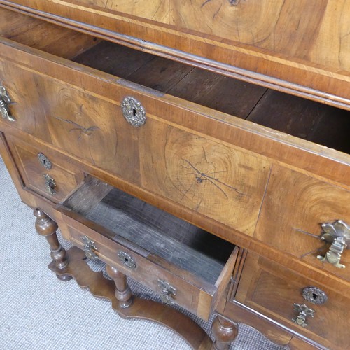 499 - A Georgian style walnut veneered Chest on stand, the 18th century top with moulded cornice over two ... 