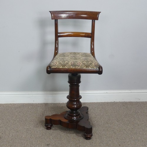 500 - An early Victorian rosewood piano / harpists Chair, raised on turned column and tripod base, W 38 cm... 