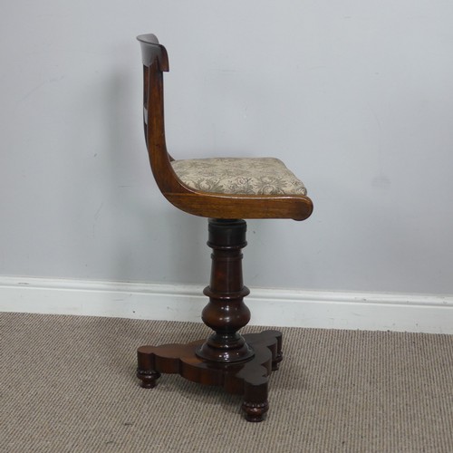 500 - An early Victorian rosewood piano / harpists Chair, raised on turned column and tripod base, W 38 cm... 