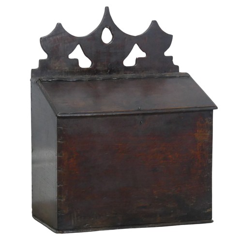 504 - An 18th century oak salt Box, shaped pierced pediment with leather hinge, W 31.5 cm x H 41 cm x D 18... 