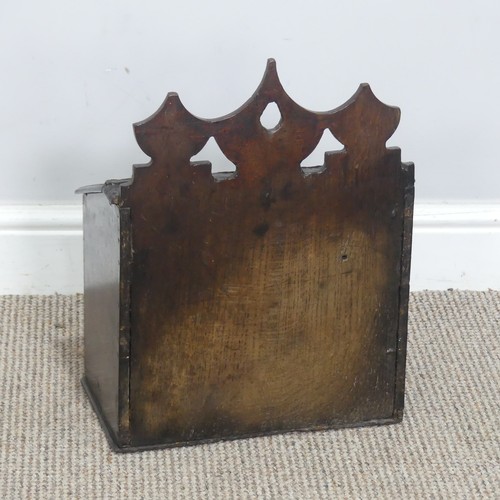 504 - An 18th century oak salt Box, shaped pierced pediment with leather hinge, W 31.5 cm x H 41 cm x D 18... 