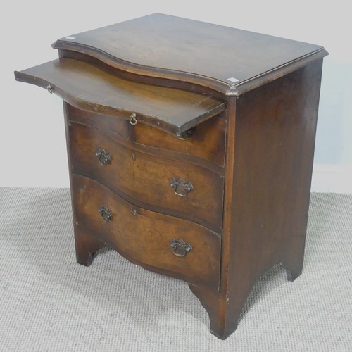 509 - An early 20th century burr walnut and mahogany serpentine Chest of drawers, of small proportions, W ... 