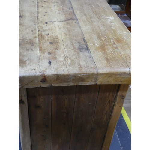 510 - An early 20th century Butchers Block on earlier pine Cabinet, large rectangular top over double side... 