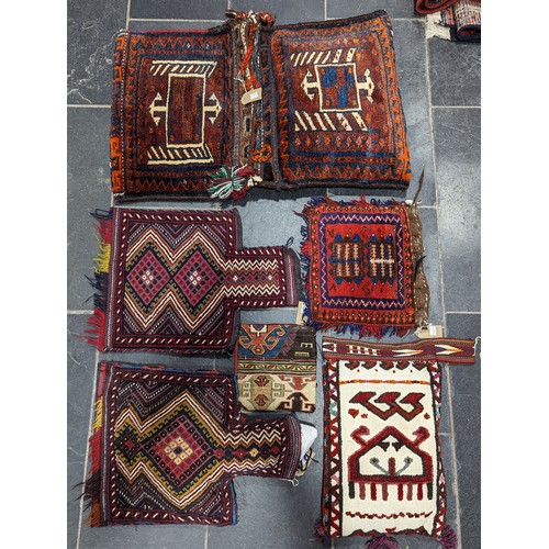 548 - Tribal Rugs: a Belouch Camel Bag, 85cm x 56cm, together with four smaller tent bags, all in good con... 