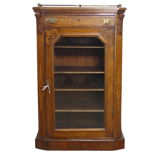 514 - A Victorian walnut inlaid music / display Cabinet, three quarter gallery over glazed door, raised on... 