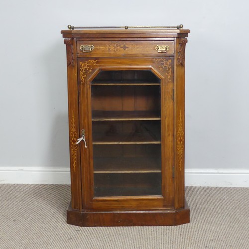 514 - A Victorian walnut inlaid music / display Cabinet, three quarter gallery over glazed door, raised on... 