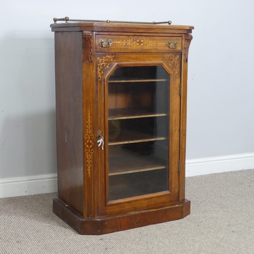 514 - A Victorian walnut inlaid music / display Cabinet, three quarter gallery over glazed door, raised on... 