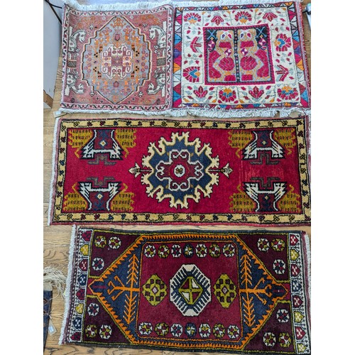 552 - Tribal Rugs: a small red Afghan ground Runner, 120cm x 52cm, together with another smaller runner of... 