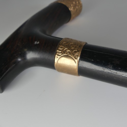 516 - A George V 9ct gold mounted walking Stick / Cane, hallmarked London 1926, with shaped coromandel han... 