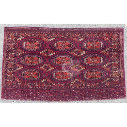 553 - Tribal Rugs: a Sumak red-ground Rug, 95cm x 120cm, good condition together with two Afghan rugs, 80c... 