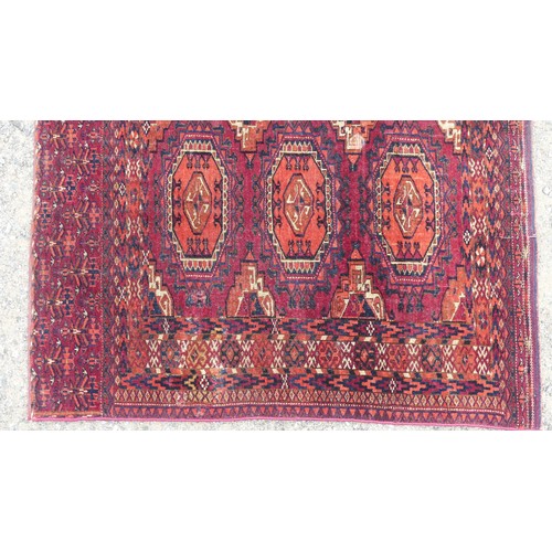 553 - Tribal Rugs: a Sumak red-ground Rug, 95cm x 120cm, good condition together with two Afghan rugs, 80c... 