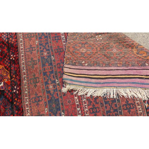 553 - Tribal Rugs: a Sumak red-ground Rug, 95cm x 120cm, good condition together with two Afghan rugs, 80c... 