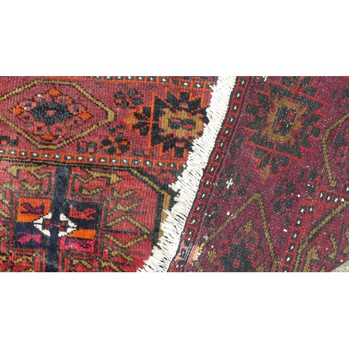 553 - Tribal Rugs: a Sumak red-ground Rug, 95cm x 120cm, good condition together with two Afghan rugs, 80c... 