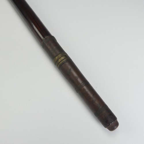 517 - A 19th century novelty metamorphic walking Cane, the top and base unscrew to assemble a pipe, with s... 