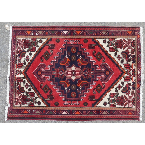 555 - Tribal Rugs: a Hamadan red-ground Rug, 147cm x 104cm, good condition, together with another similar,... 