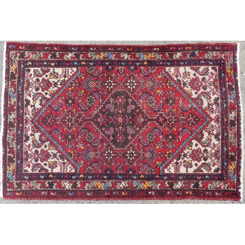 555 - Tribal Rugs: a Hamadan red-ground Rug, 147cm x 104cm, good condition, together with another similar,... 