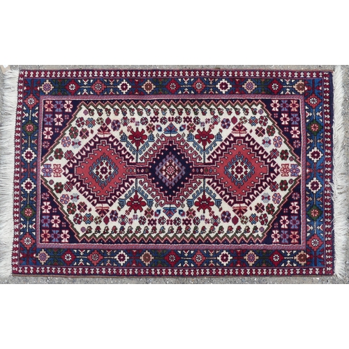 558 - Tribal Rugs; a Hamadan cream and blue-ground Rug, 136cm x 183cm, together with another similar, 92cm... 